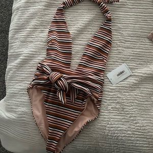 Montce tie up one piece. Brand new with tags on, never worn.